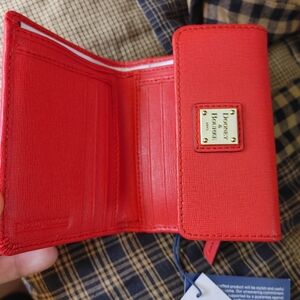 firm on priceSmall Dooney & Bourke Wallet like New color Tomato 🍅